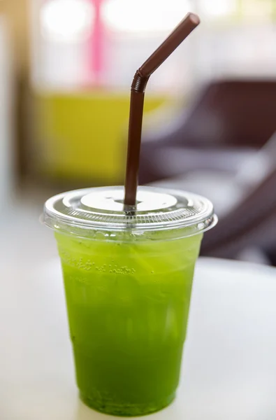 Iced kiwi juice take home — Stock Photo, Image