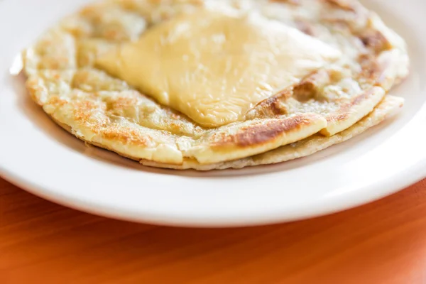 Roti prata with chesse on plate — Stock Photo, Image