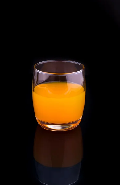 Un vaso de zumo de naranja — Foto de Stock