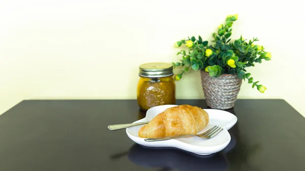Coffee break with french croissant — Stock Photo, Image