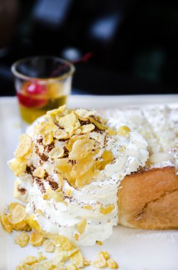 Honey toast with whipped cream on top