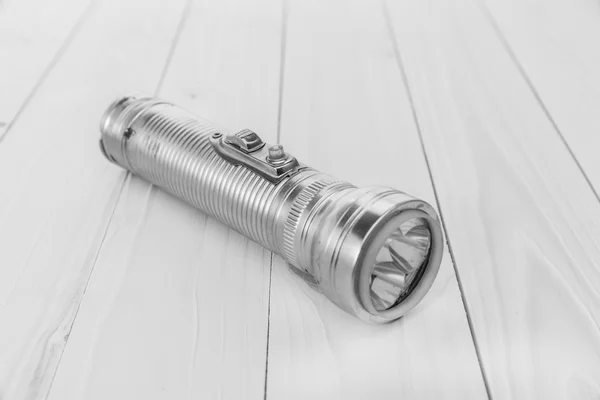 Long aluminum flashlight — Stock Photo, Image