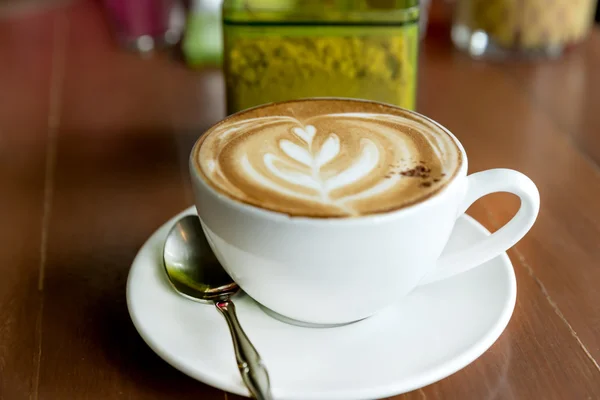 Coffee on brown wooden table — Stock Photo, Image