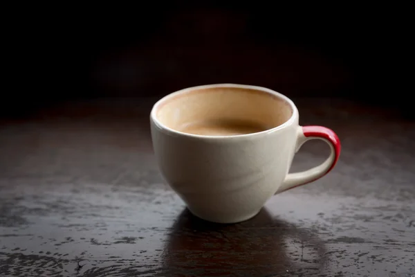 Coffee mug in coffee shop cafe — Stock Photo, Image