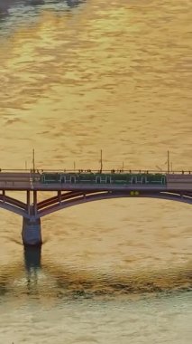 Aerial drone footage of the Basel old town along the Rhine river which contrast with modern skyscrapers in Switzerland. 