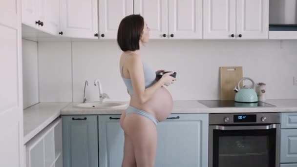 Young Pregnant Girl Blue Underwear Eating Granola Kitchen Alone — Stock Video