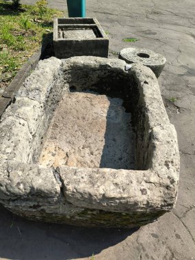 Stone troughs outdoors. High quality photo