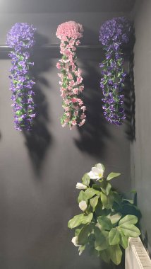 October 22 2024 Hradec Kralove, Czech Republic Europe, Kralov region, Kralovehradecky kraj, Hanging artificial flowers. High quality photo