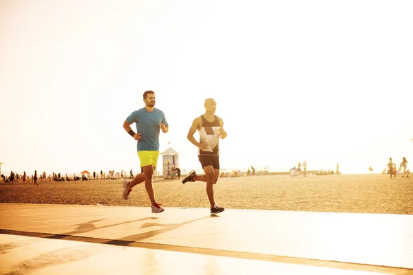 Jogging on the beach — Stock Photo, Image