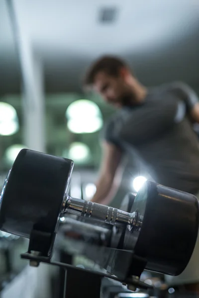 Working with dumbbells — Stock Photo, Image