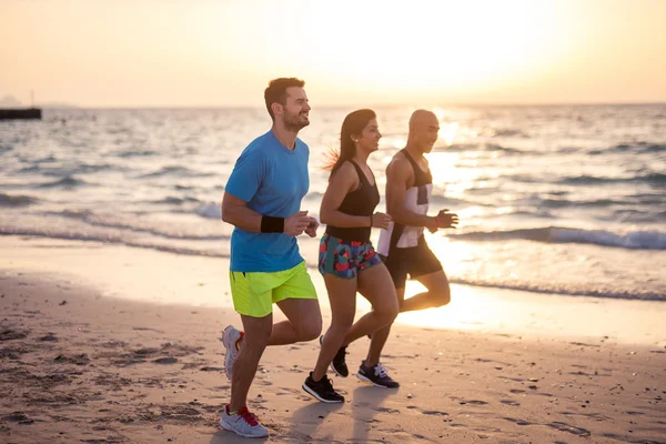 Jogging on the beach — Stock Photo, Image