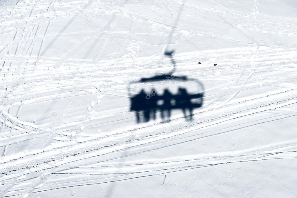 Shadow of the chairlift in the snow