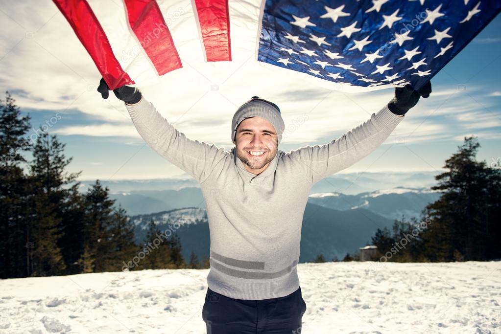 Cheerful young man with USA flag
