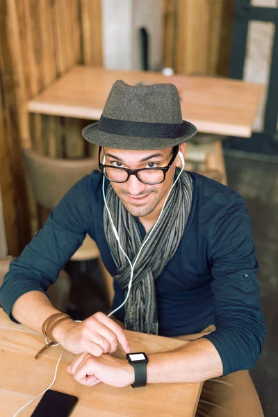 Checking his smartwatch — Stock Photo, Image