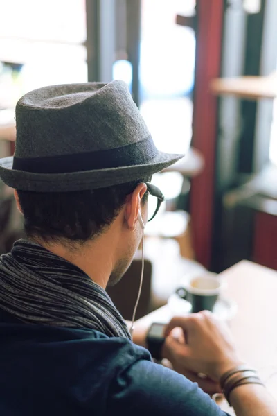 Checking his smartwatch — Stock Photo, Image