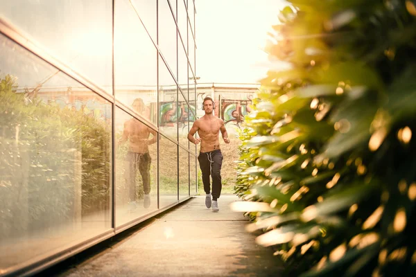 Young male jogging — Stock Photo, Image