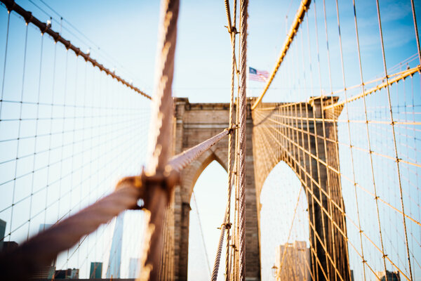 Photo of a Brooklyn Bridge construction. Selective focus, natural light.