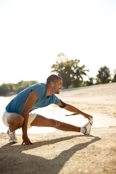 Stretching tired muscles — Stock Photo, Image