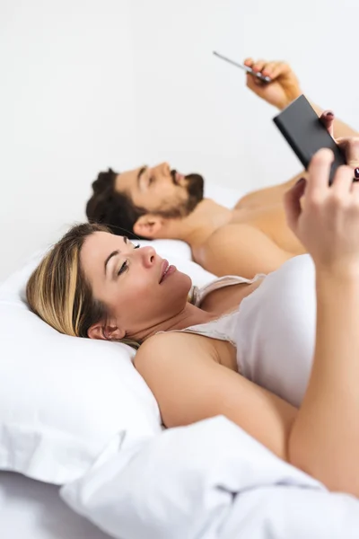 Relaxing in bed — Stock Photo, Image