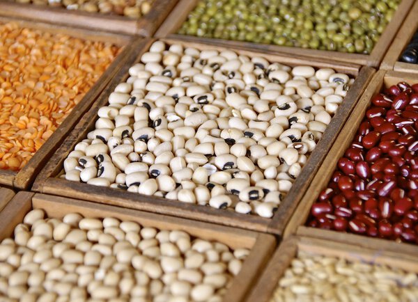 Closeup of seeds and grains in wooden box