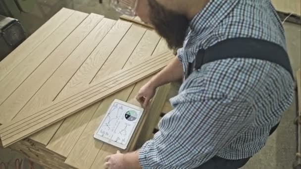 Carpenter working at workshop — Stock Video