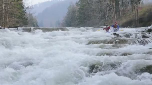 Extreme rafting on a catamaran with waterfall — Stock Video