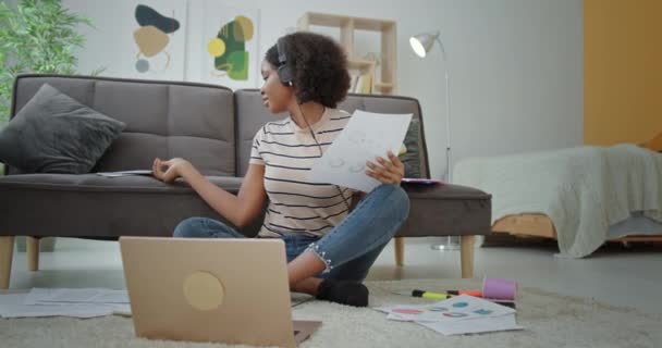 Content black woman working with documents at home — Stock Video