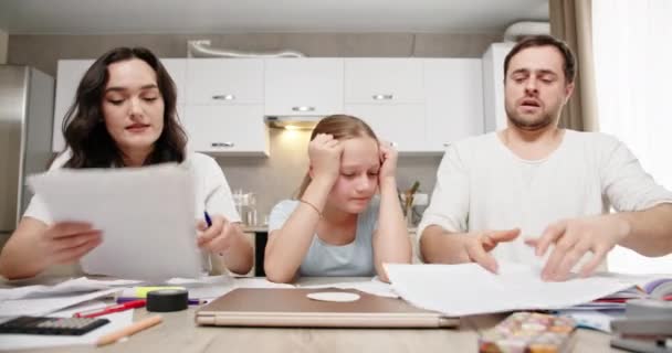 Irritated parents helping daughter with homework — Stock Video