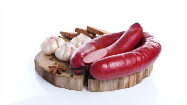 Meat delicacies on kitchen board isolated white background — Stock Video