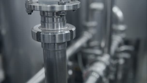 Modern equipment at the plant. Stainless steel pipe close up. — Stock Footage Modern equipment at the plant. Stainless steel pipe close up. Stock Video
