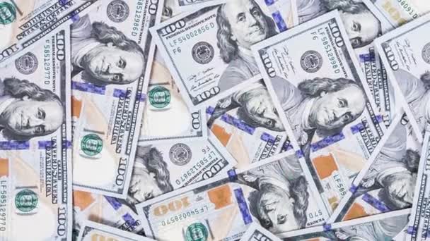 Antecedentes con dinero billetes de cien dólares estadounidenses rotan — Vídeo de stock