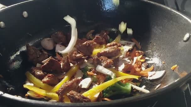 Wok sauté — Video