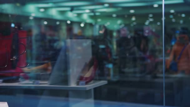 Two excited happy women looking in shop window — Stock Video