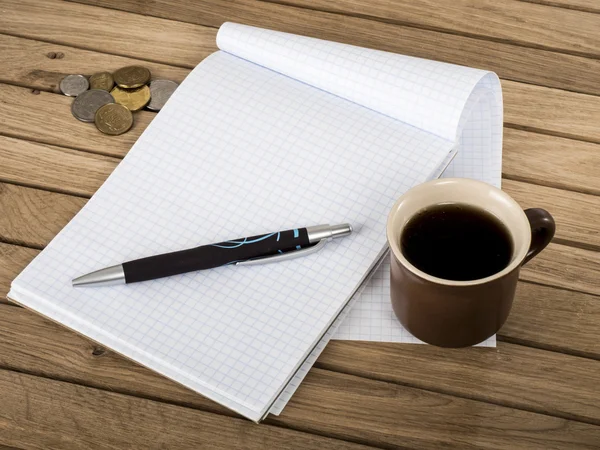 Coffee cup and notebook — Stock Photo, Image