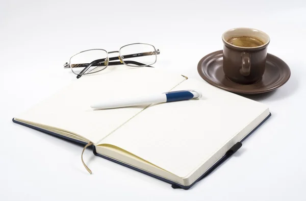 Notizbuch Kaffee und Stift — Stockfoto