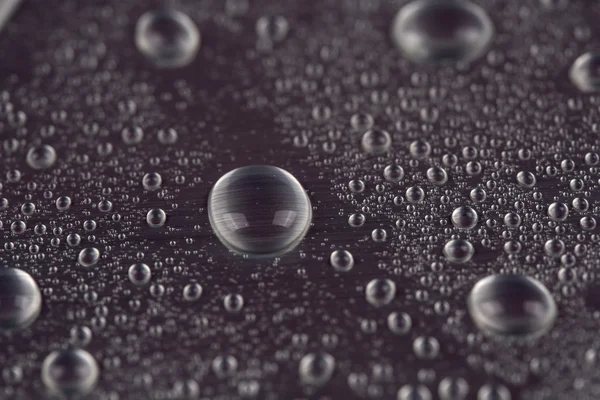 Gotas de agua sobre fondo azul —  Fotos de Stock