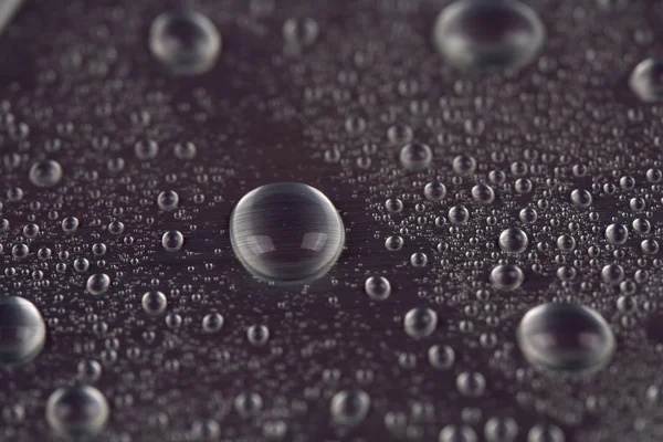 Gotas de água no fundo azul — Fotografia de Stock