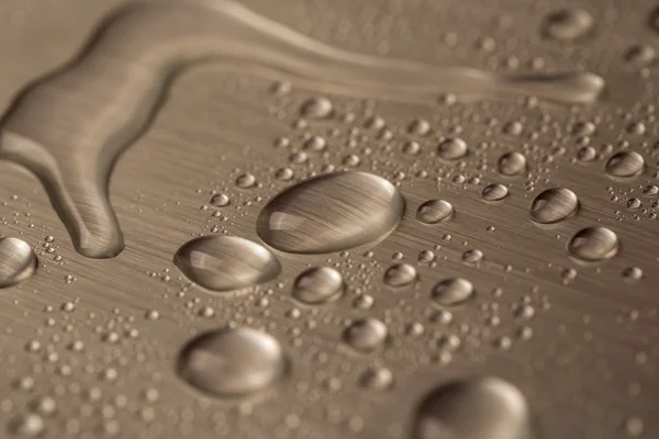 Gotas de agua sobre fondo azul —  Fotos de Stock