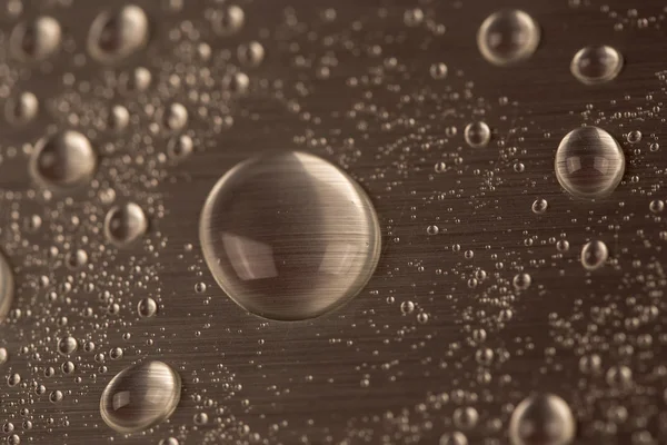 Gotas de agua sobre fondo azul —  Fotos de Stock