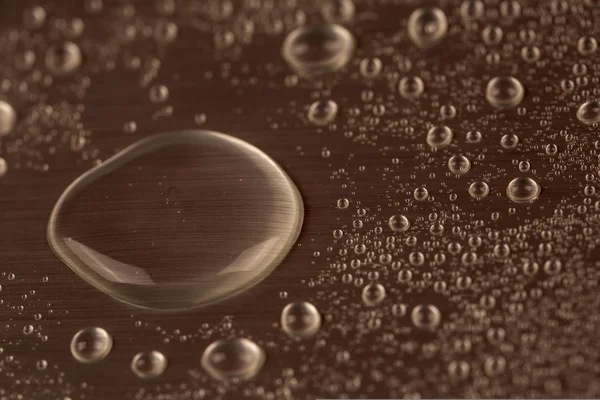 Gotas de agua sobre fondo azul —  Fotos de Stock