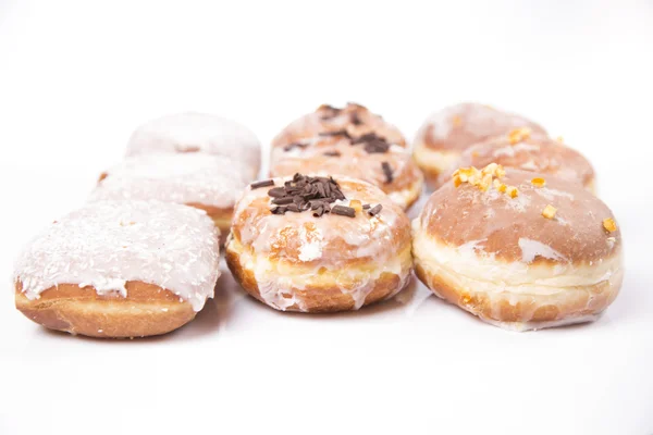 Fresh jummy isolated donuts on white background — Stock Photo, Image