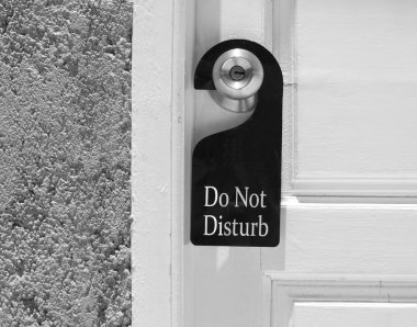 Do not disturb sign hang on door knob clipart