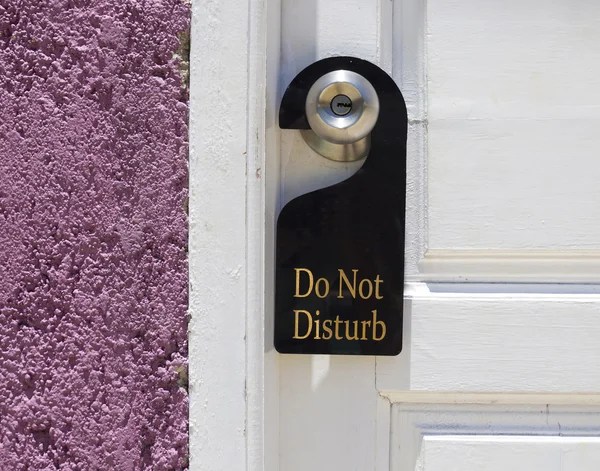 Do not disturb sign hang on door knob — Stock Photo, Image