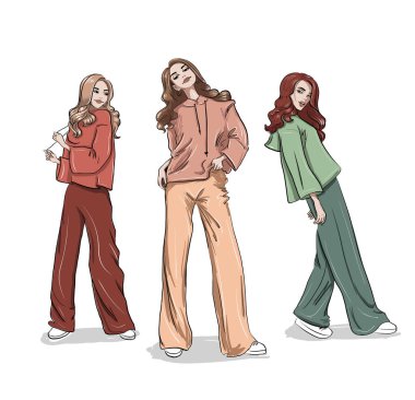 Sıradan kapüşonlu ve pantolonlu kadınlar.