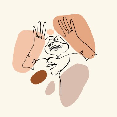 Kalp şeklindeki eller göz hizasında.