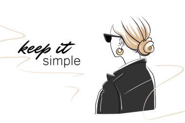 Gözlüklü ve ceketli modacı kadın.