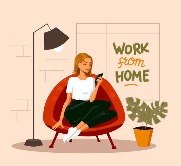 Woman sitting in the chair looking at smartphone