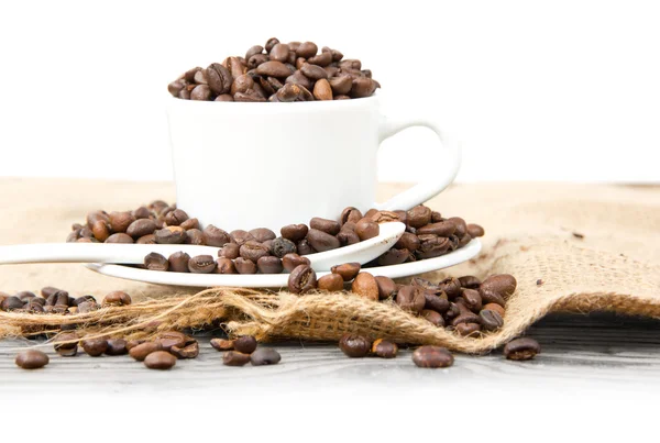 Taza de café con granos — Foto de Stock