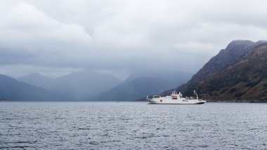 Cable ship at Scotland coast clipart