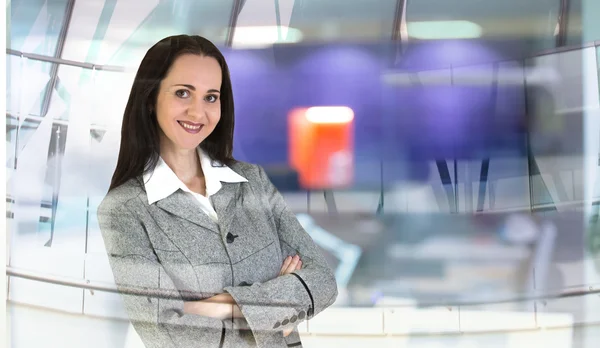 Attractive business woman portrait in the office. Business and modern life concept